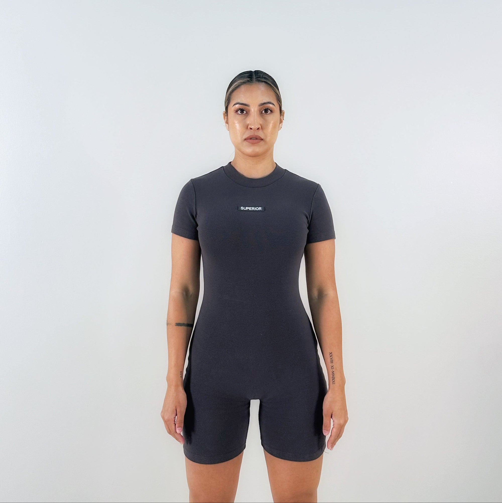 model in slate catsuit